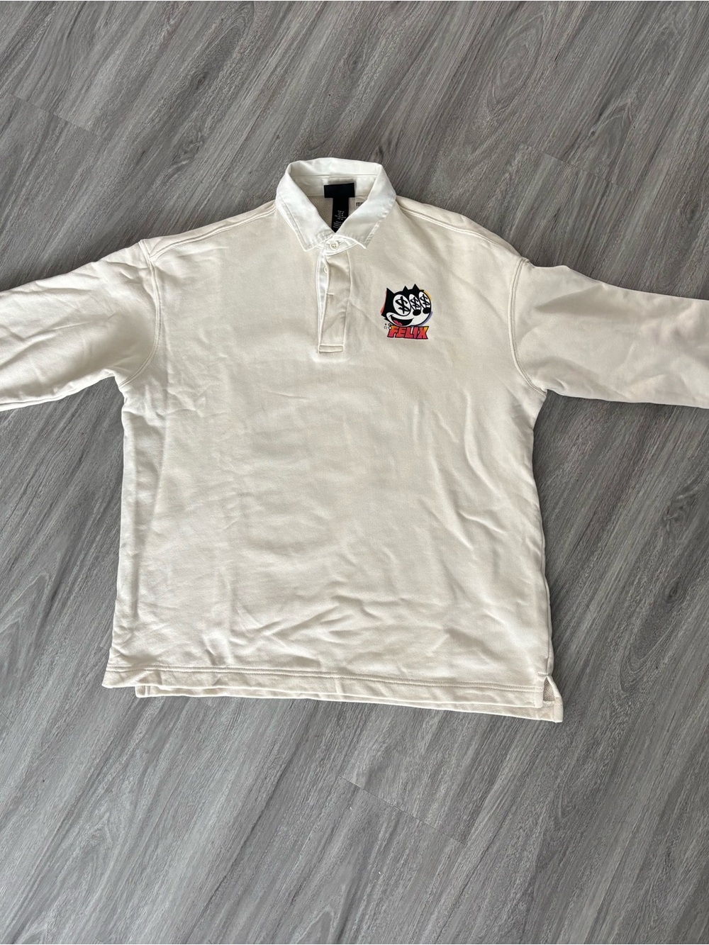 H&M White Rugby Polo with Cartoon Felix Patch